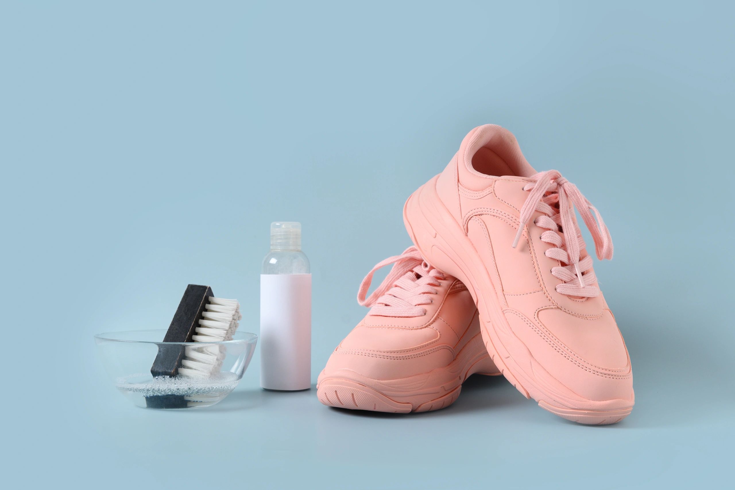 Sneaker restoration and cleaning tools with worn sneakers