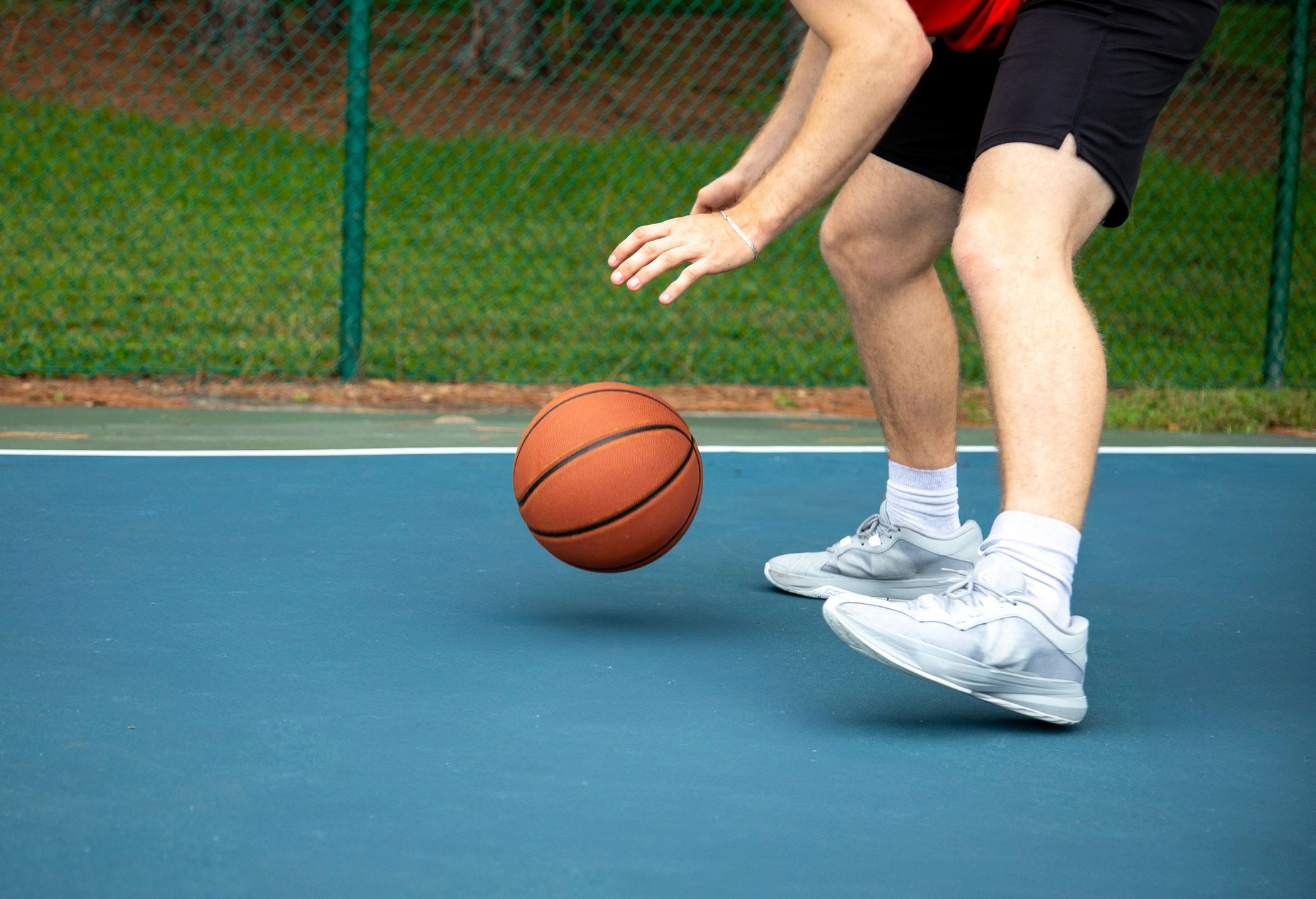 Basketball-inspired high-top sneakers close-up on court